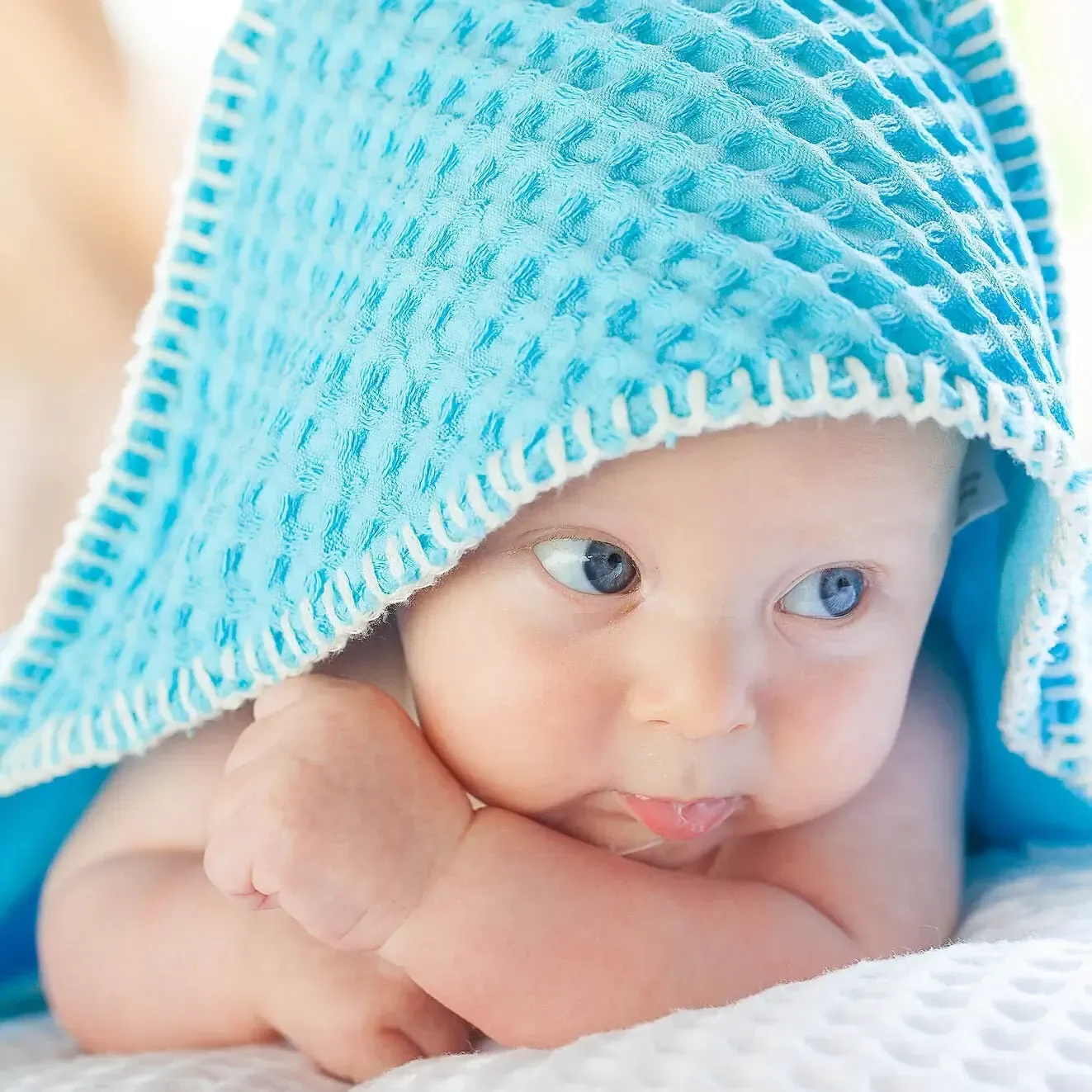 Hier kun je goed zien dat een reflectiescherm het gezicht van de baby mooi zacht belicht.
